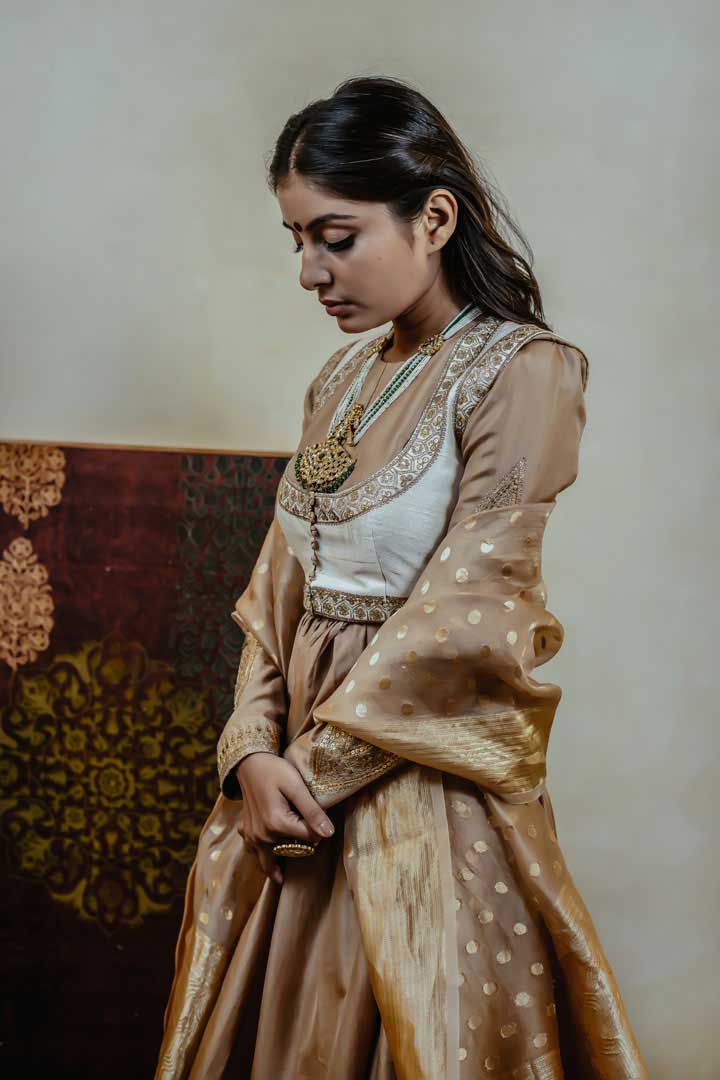 Satvik beidge anarkali with palazzo and offwhite embroidered jacket